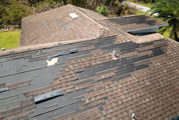 Storm damaged roof in the Lowcountry, insurance claim handled by Tides Team